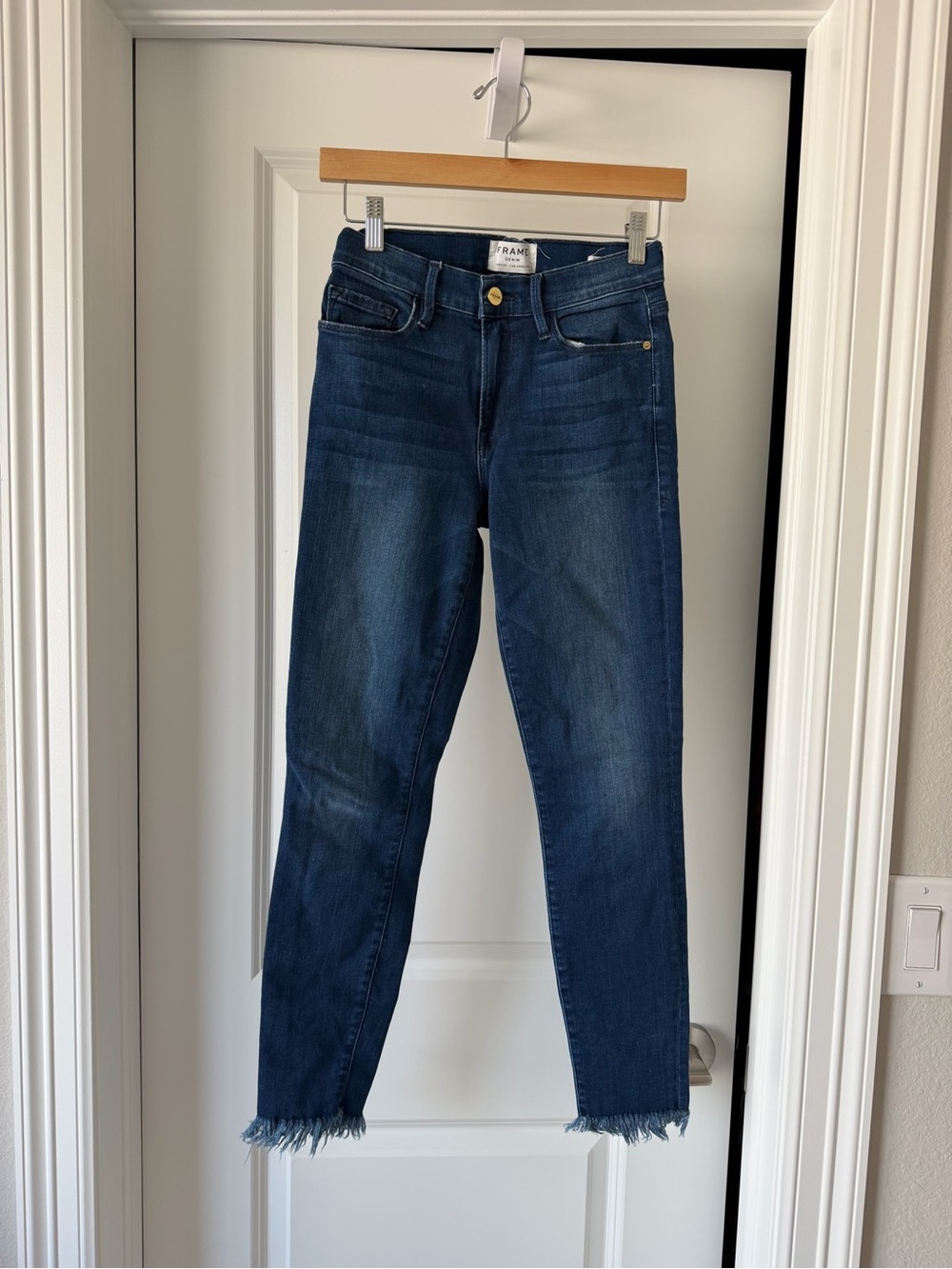 Frame Denim Skinny Jeans in Dark Blue with Frayed Hem